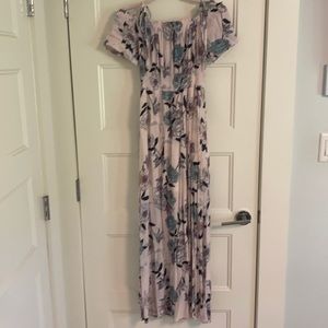 Flowy, floral dress with slits.